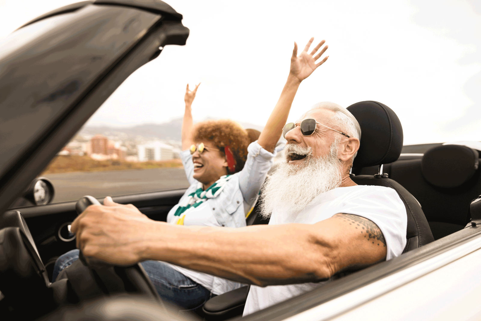 happy couple in a car